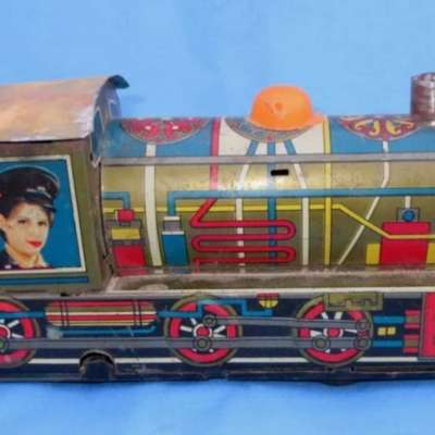 Vintage Old Rare Collectible Friction Powered Sparkling Train Litho Tin Toy Profile Picture